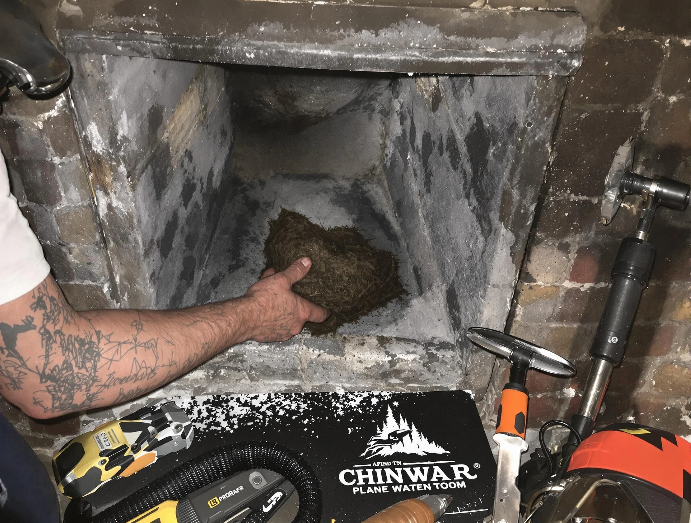 Clearfield Chimney Sweep safely removing debris and screening chimney in Clearfield, UT